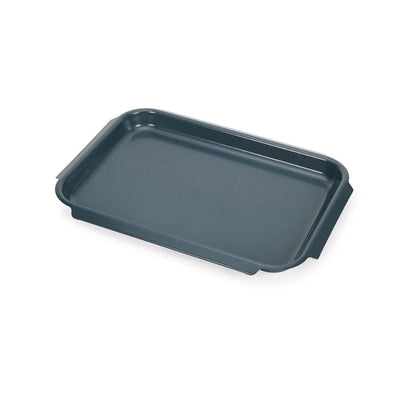 Joseph Joseph Nest Bake non-stick medium baking tray with a smooth surface and rounded edges on a white background.