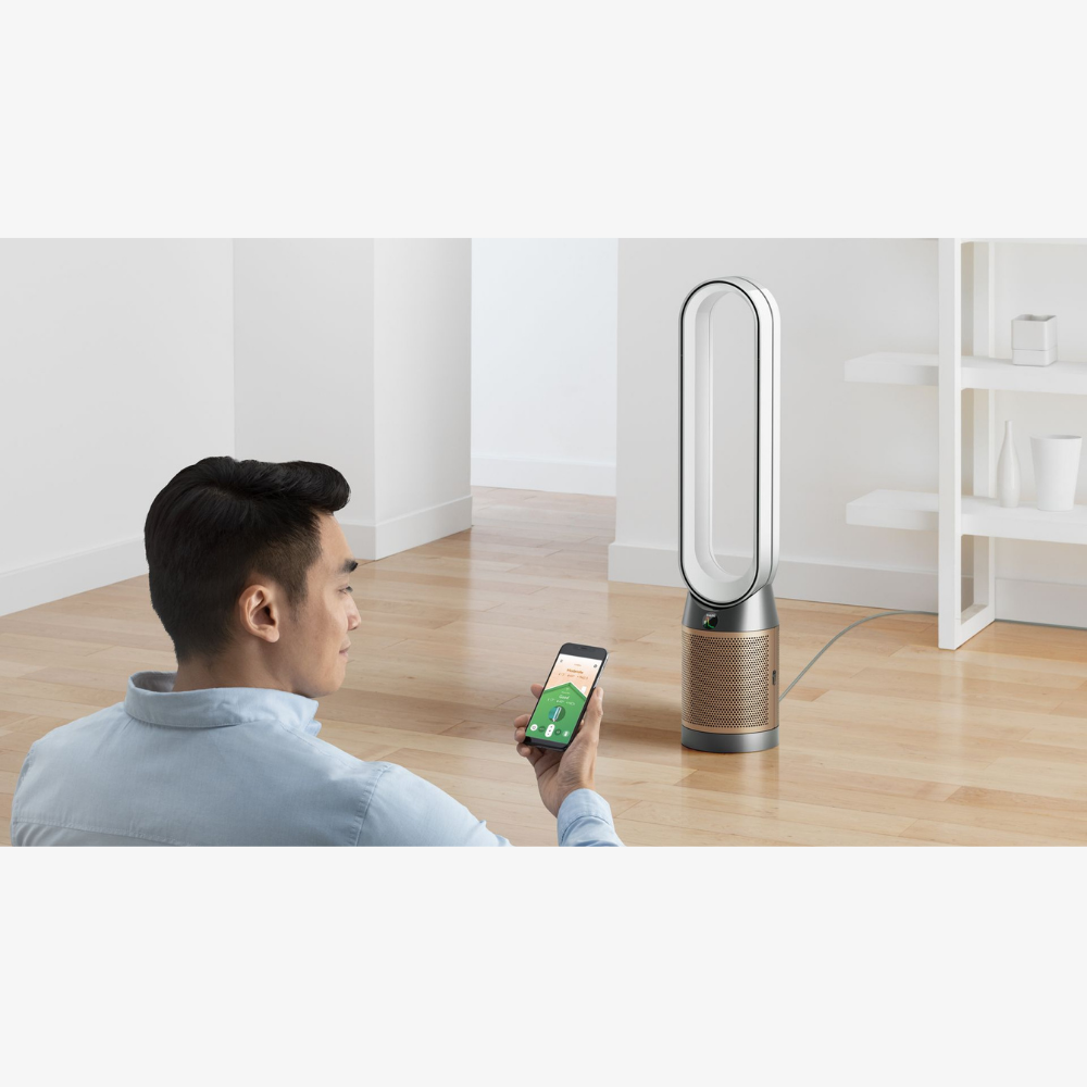 Dyson Purifier Cool PC2 De-NOx in nickel and gold, showcasing sleek design and modern air purification features.
