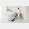 Dyson Wash G1 Wet Cleaner in Ultra Blue and Matt Black, showcasing its sleek design and efficient vacuum features.