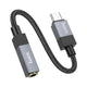 A Hoco USB-C to 3.5mm audio adapter cable on a solid white background, featuring a black braided cable and metallic silver and black connectors.