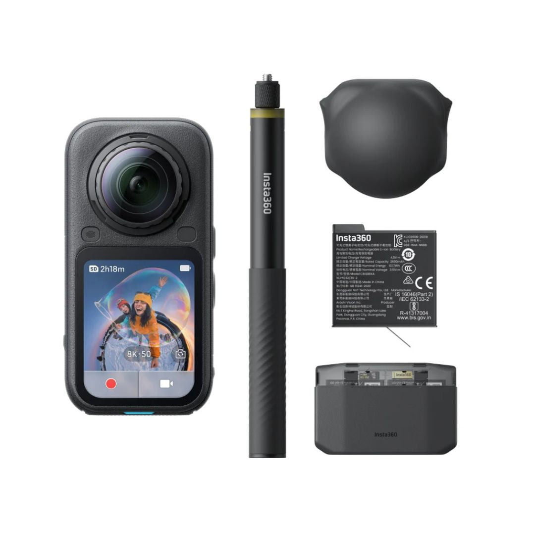Insta360 action camera shown with included accessories on a clean white background: a black handheld stylus, a black protective cover, a battery, and a charging dock. The camera front display is on and shows the Insta360 branding.