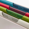 Large Joseph Joseph Folio Icon 4-piece multicolour cutting board set displayed with vibrant colors and unique design.