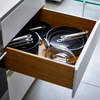 Joseph Joseph blue 28cm ceramic non-stick sauté pan with a folding handle and matching lid on a white background.