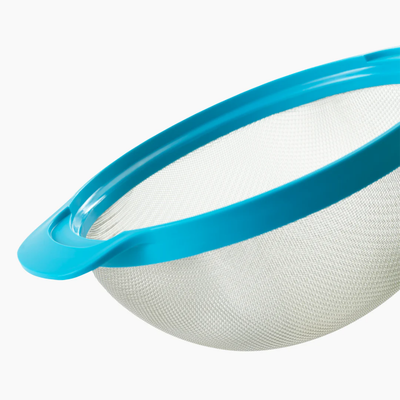 Joseph Joseph Nest 9 Plus multicolor bowl set featuring various sized bowls stacked together on a countertop.