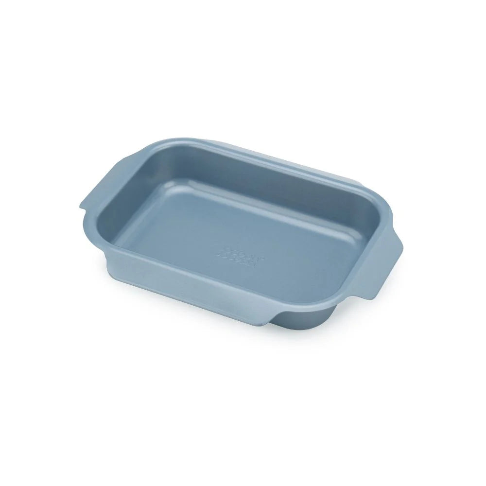 Small Joseph Joseph Nest oven tray with a sleek design, ideal for baking and roasting in home kitchens.