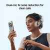 Woman using a smartphone with earbuds, highlighting dual-mic AI noise reduction feature.