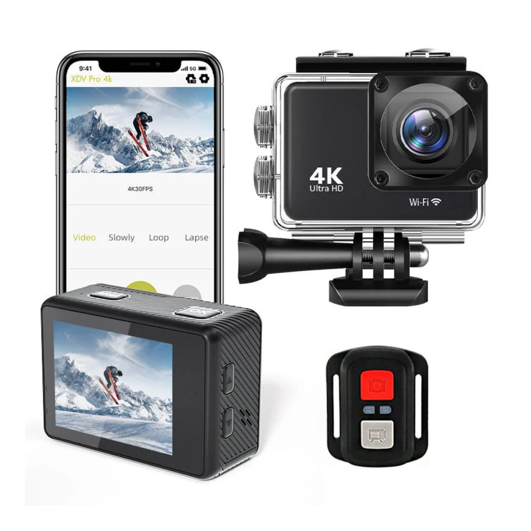 Black action camera shown with a clear protective housing, a mounting bracket, a screen display, a smartphone showing a snowy mountain app interface, and a small remote control on a white background.