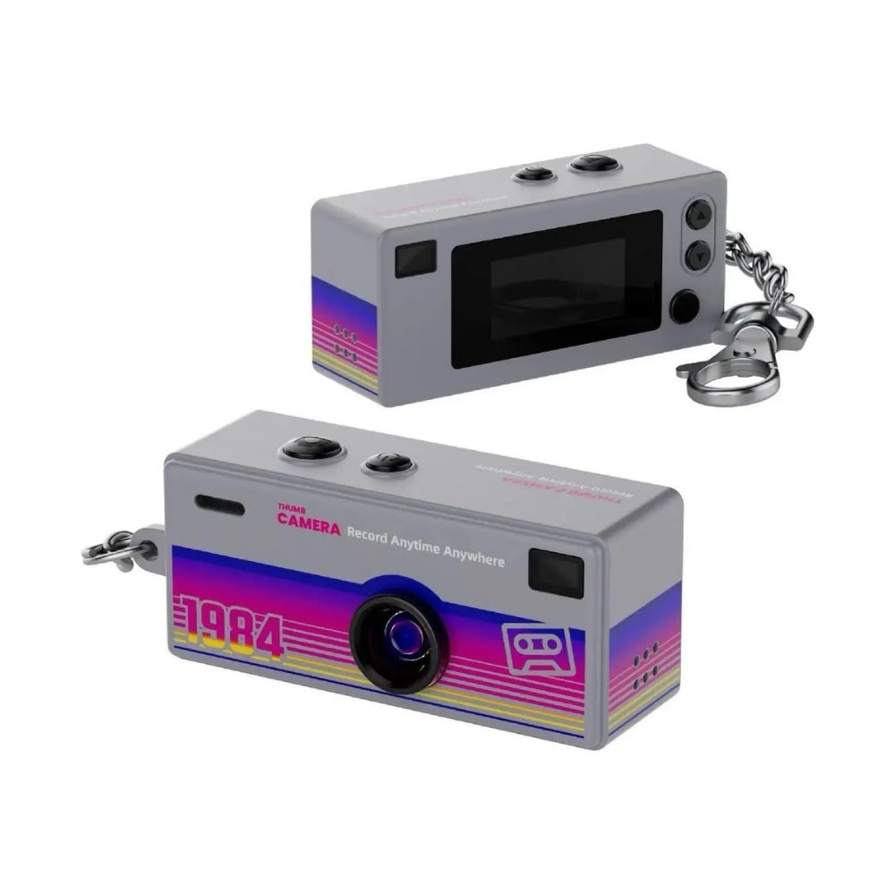 Gray Mini G6 Keychain Camera capturing photos and videos, compact design, built-in lens, perfect for discreet recording.