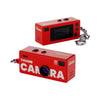 Red mini G6 Keychain Camera capturing photos and videos, compact design with keyring attachment for easy portability.