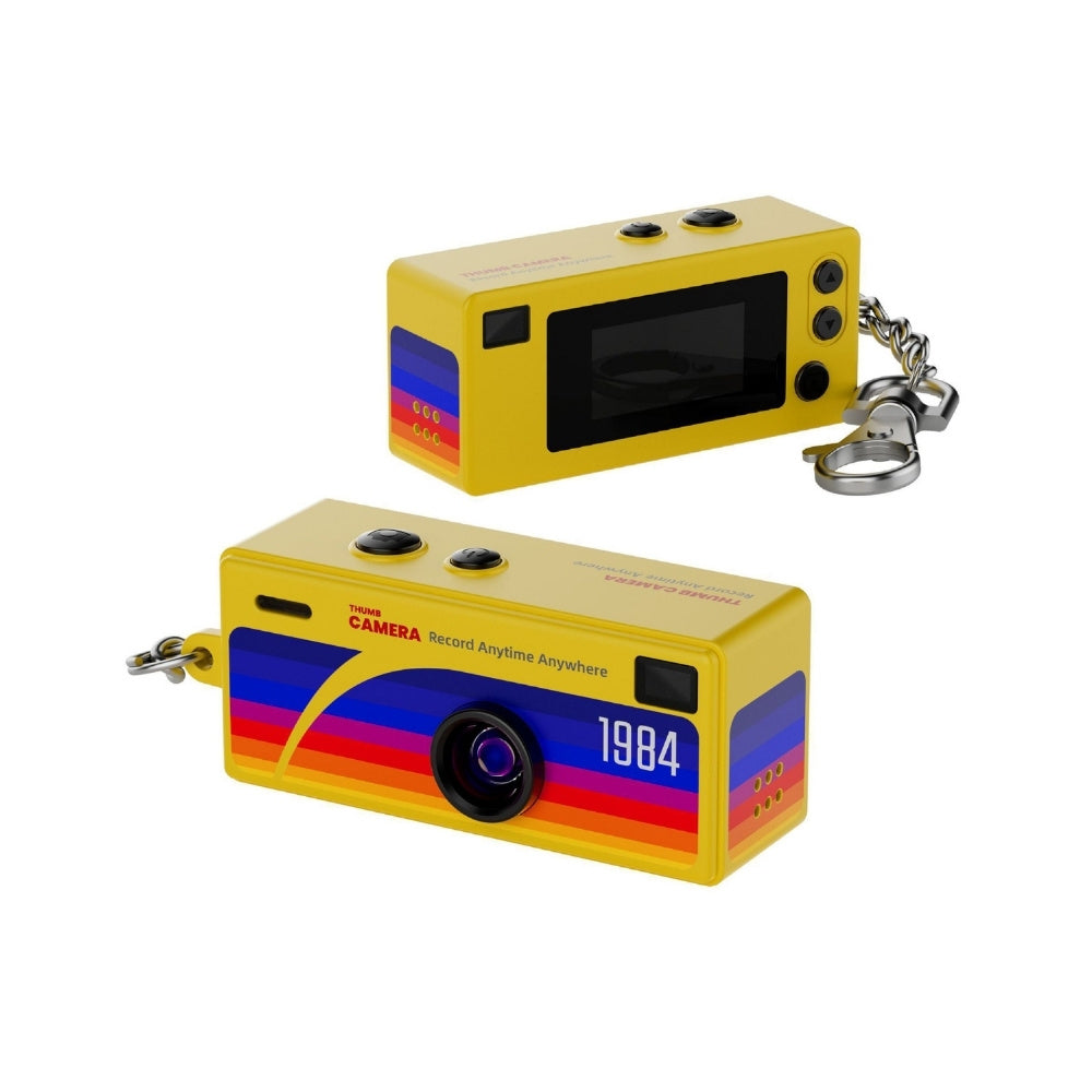 Yellow G6 mini keychain camera capturing photo and video, compact device with lens and keyring attachment for portable recording.