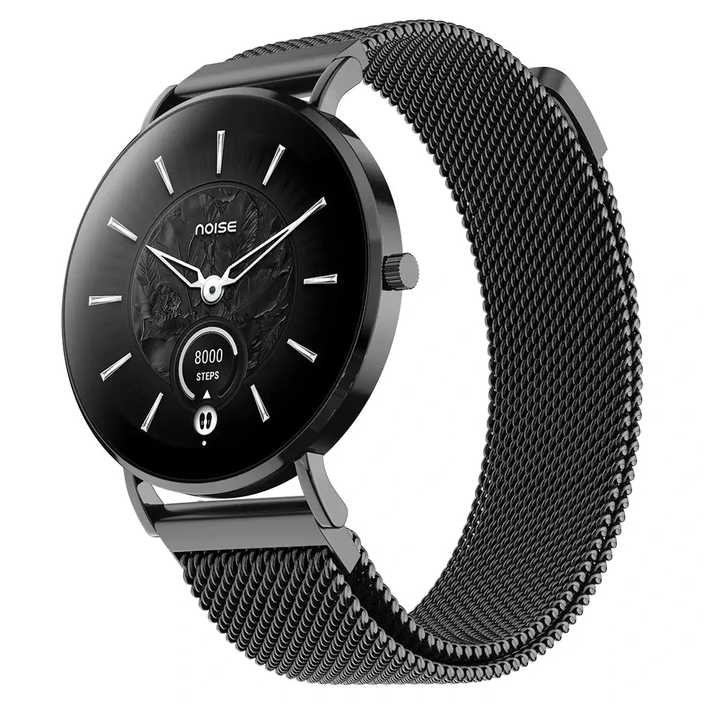 A black smartwatch with a round face and a matching black mesh strap, shown on a plain white background. The watch face displays the brand name 'noise' and a step counter graphic.