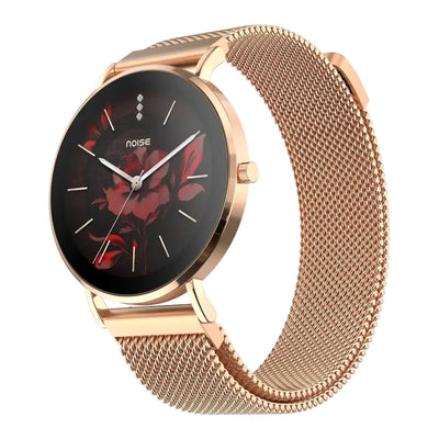 A rose gold women's watch with a mesh metal band, featuring a black round dial decorated with a red floral pattern and the brand name 'noise'.