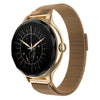 A gold-tone smartwatch with a black face displaying a celestial hand design, paired with a matching gold-tone mesh band, shown on a plain white background.